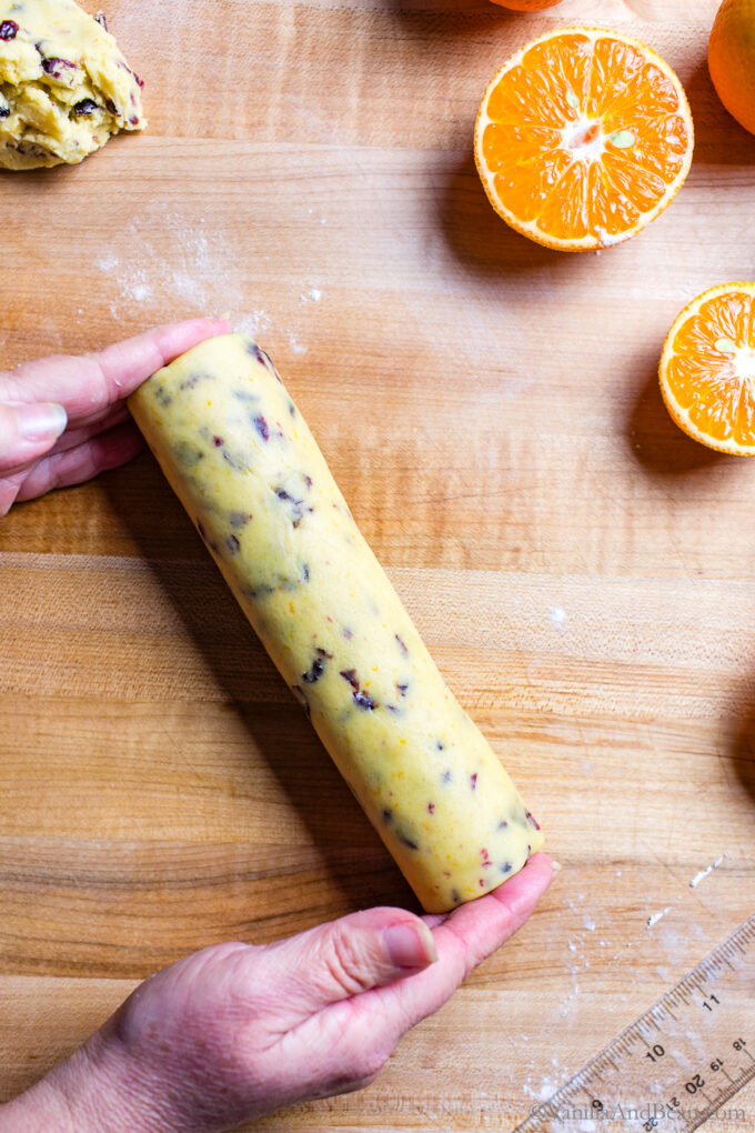 Rolled slice and bake cranberry orange shortbread cookie dough.