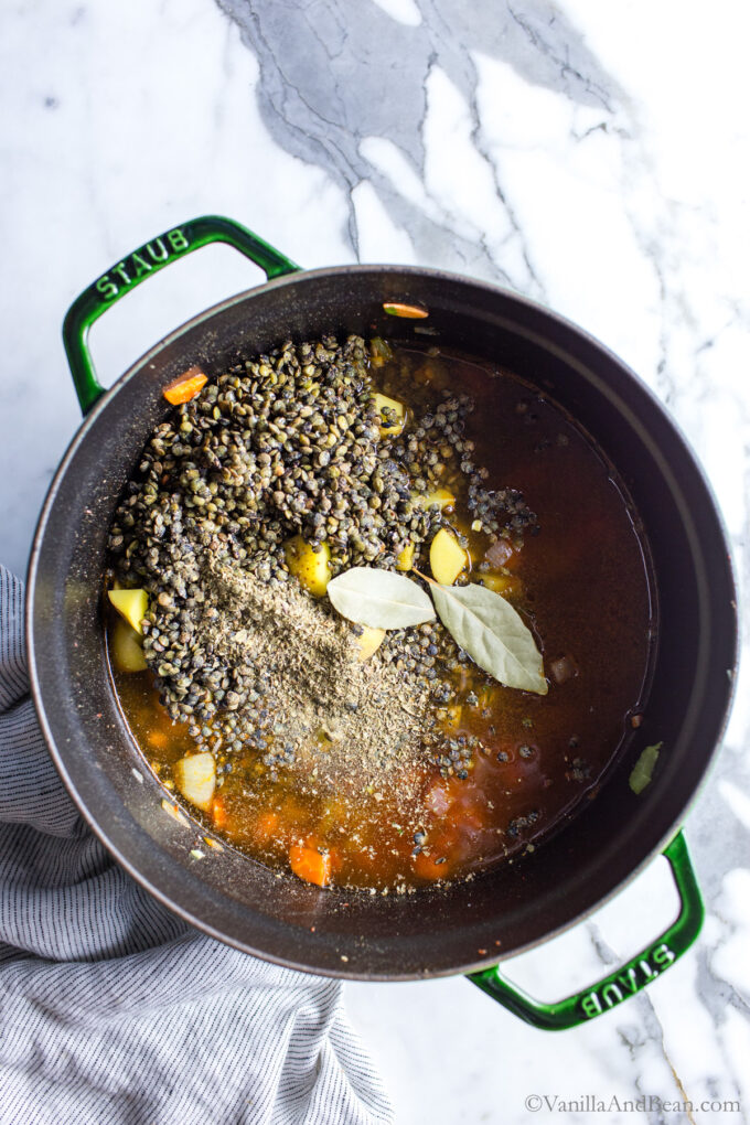 Add the broth and seasonings.