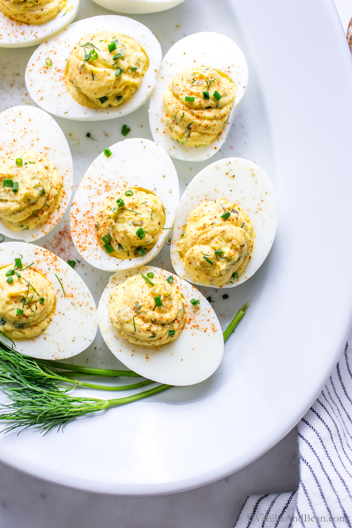 Dill Pickle Deviled Eggs on a serving platter.