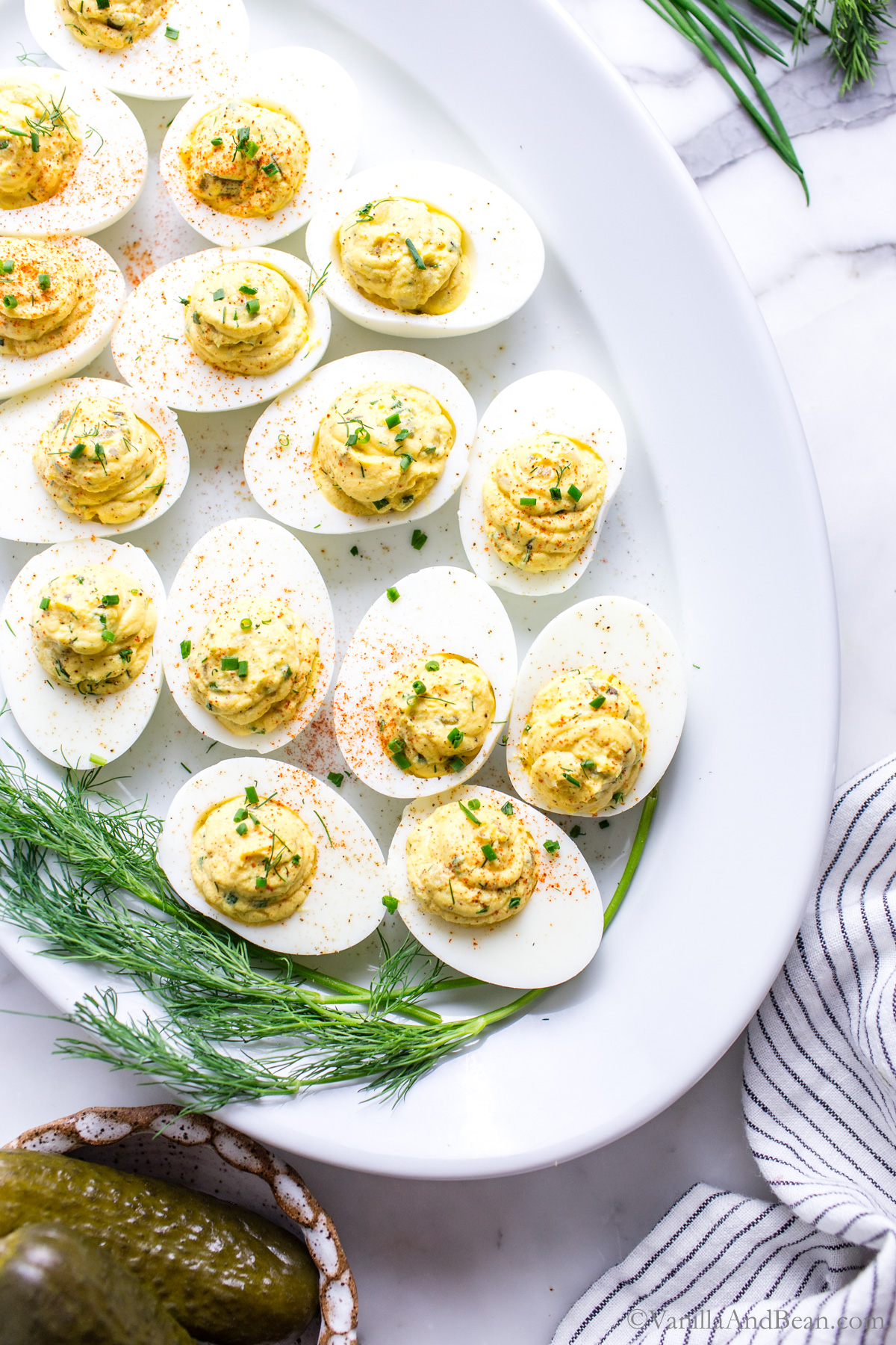 Dill Pickle Deviled Eggs on a serving platter.