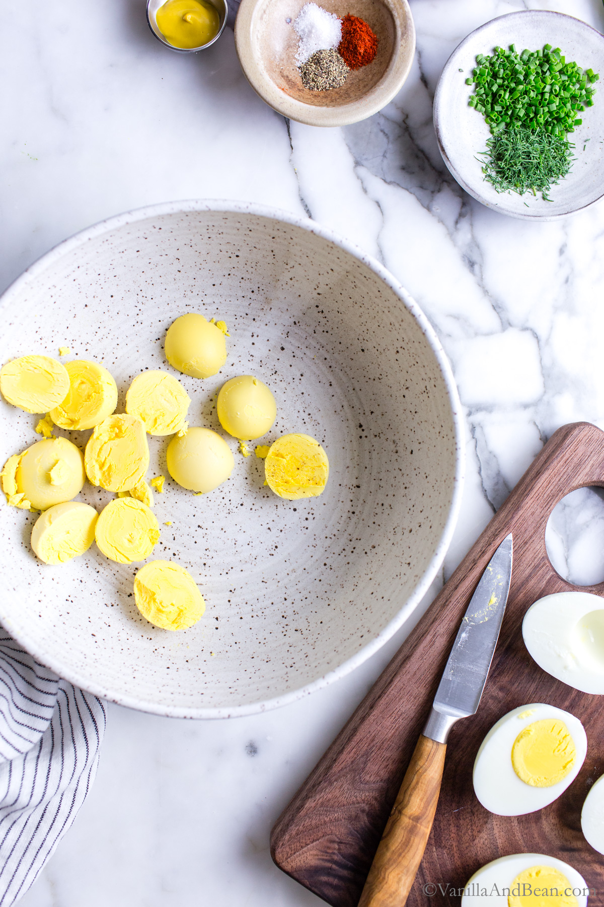Hard cooked egg yolks in a bowl.