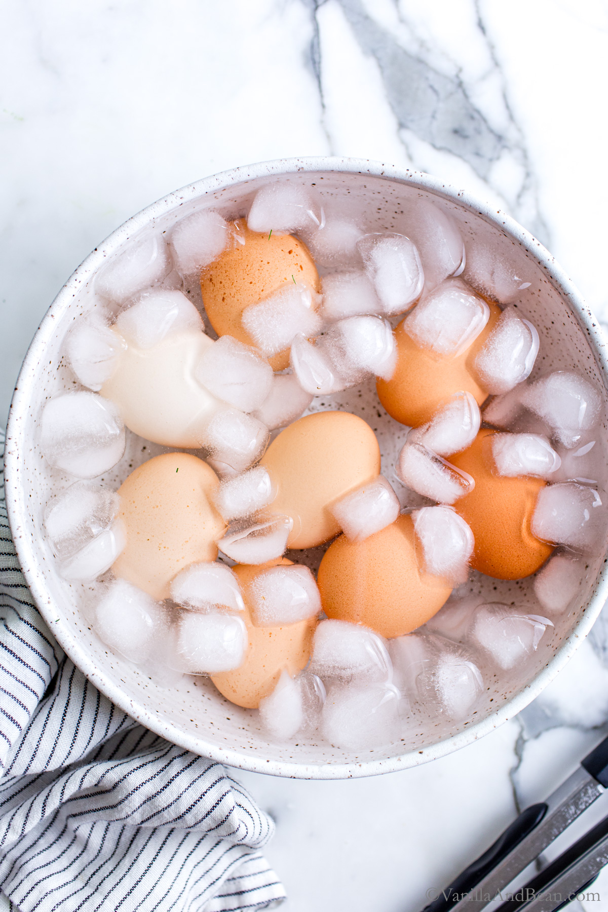 Fresh eggs in an ice bath.