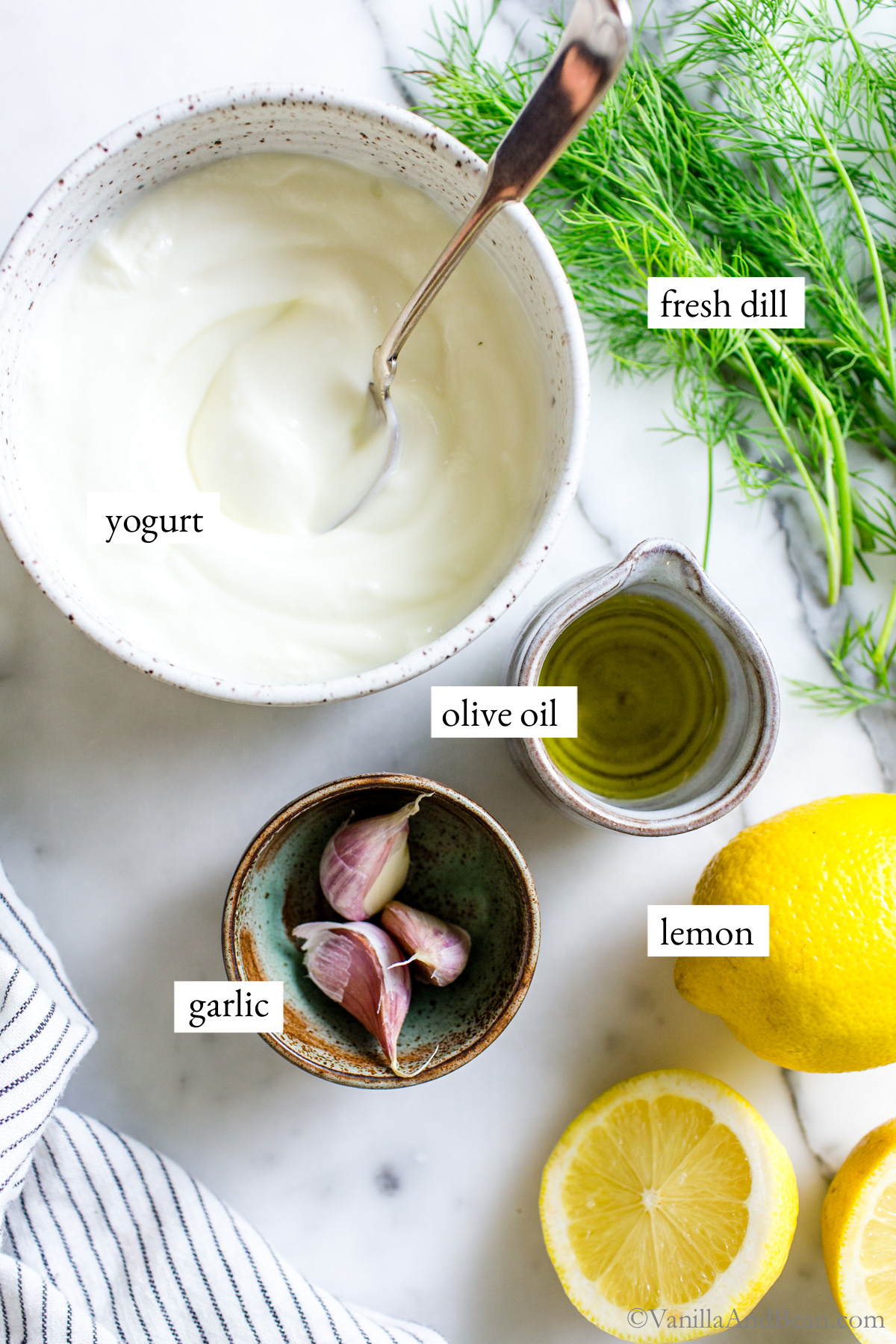 Lemon dill sauce or dip ingredients on a table.